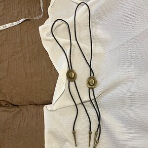 Classic Western Bolo Tie with Gold and Black Design